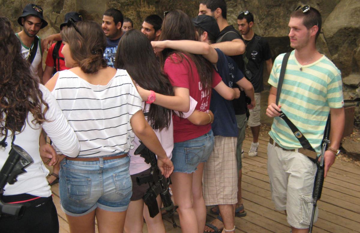 A group of young armed Israelis. Photo: Fr Colin McLean