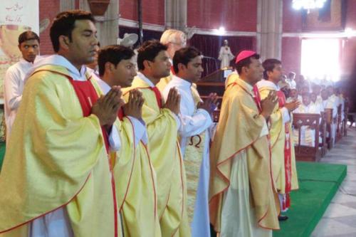 Archbishop Sebastian Shaw of Lahore with the newly ordained at Sacred Heart Cathedral, Lahore, Pakistan, April 8, 2016. Credit: Asif Nazir.