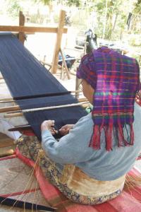 Modern Kachins prefer mechanical looms, but they also need to preserve their own identities and the traditional hand done weaving on back strap looms.