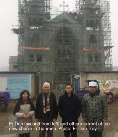 Fr Dan [second from left] and others in front of the new church in Tianmen. Photo: Fr Dan Troy