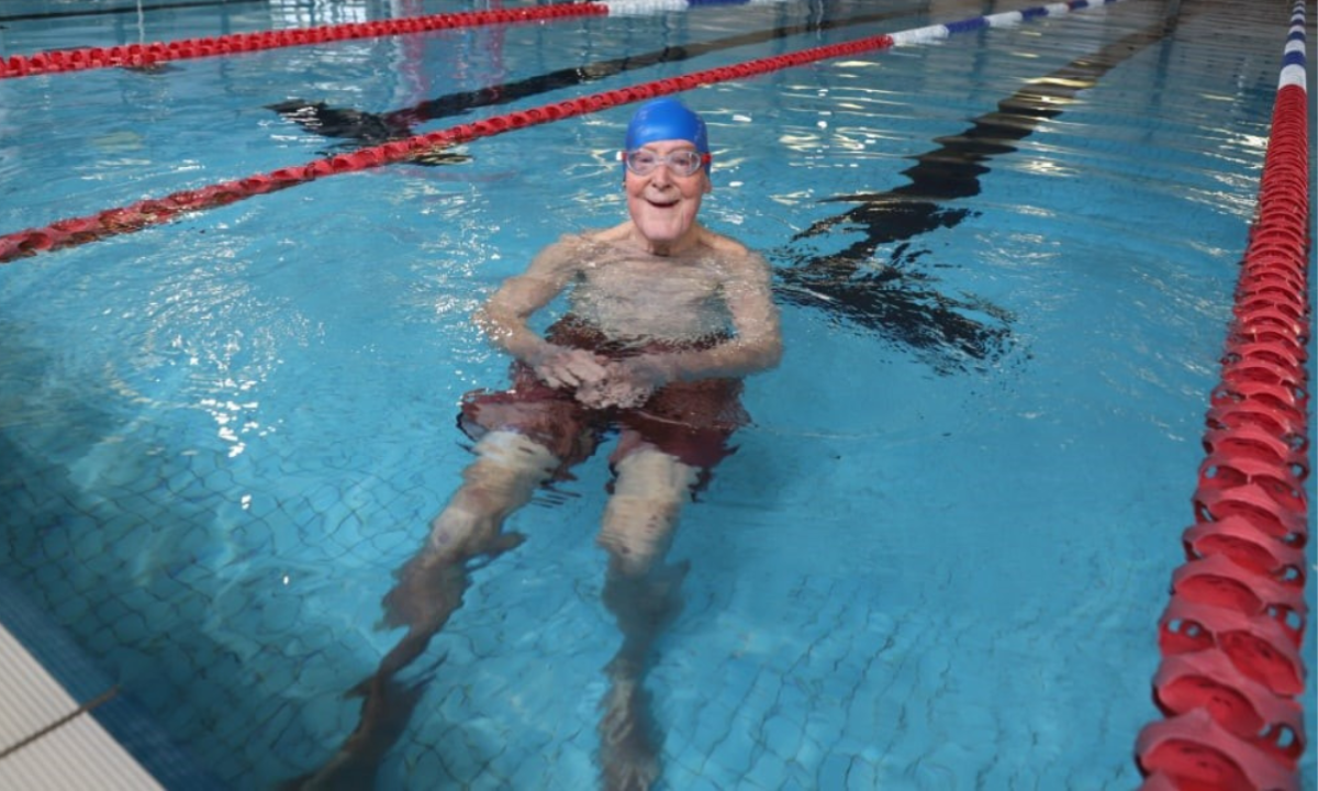 Fr Chris enjoys swimming laps and floating in the shallow end. - Photo: Mercy Health