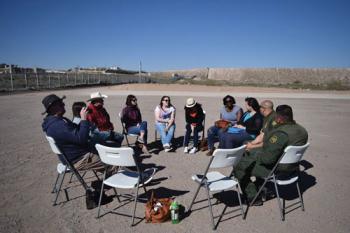 The group with the Border Guards at the US/Mexican Fence.