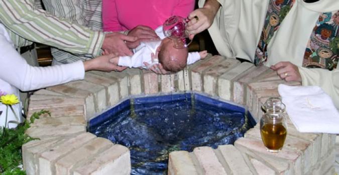 Parents and godparents gather for the baptism - Photo: Bigtockphoto.com