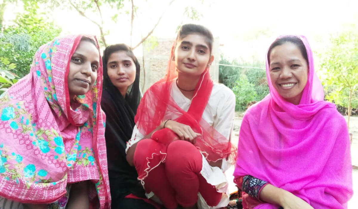 Monalisa [right] with friends. Photo: Columbans, Pakistan