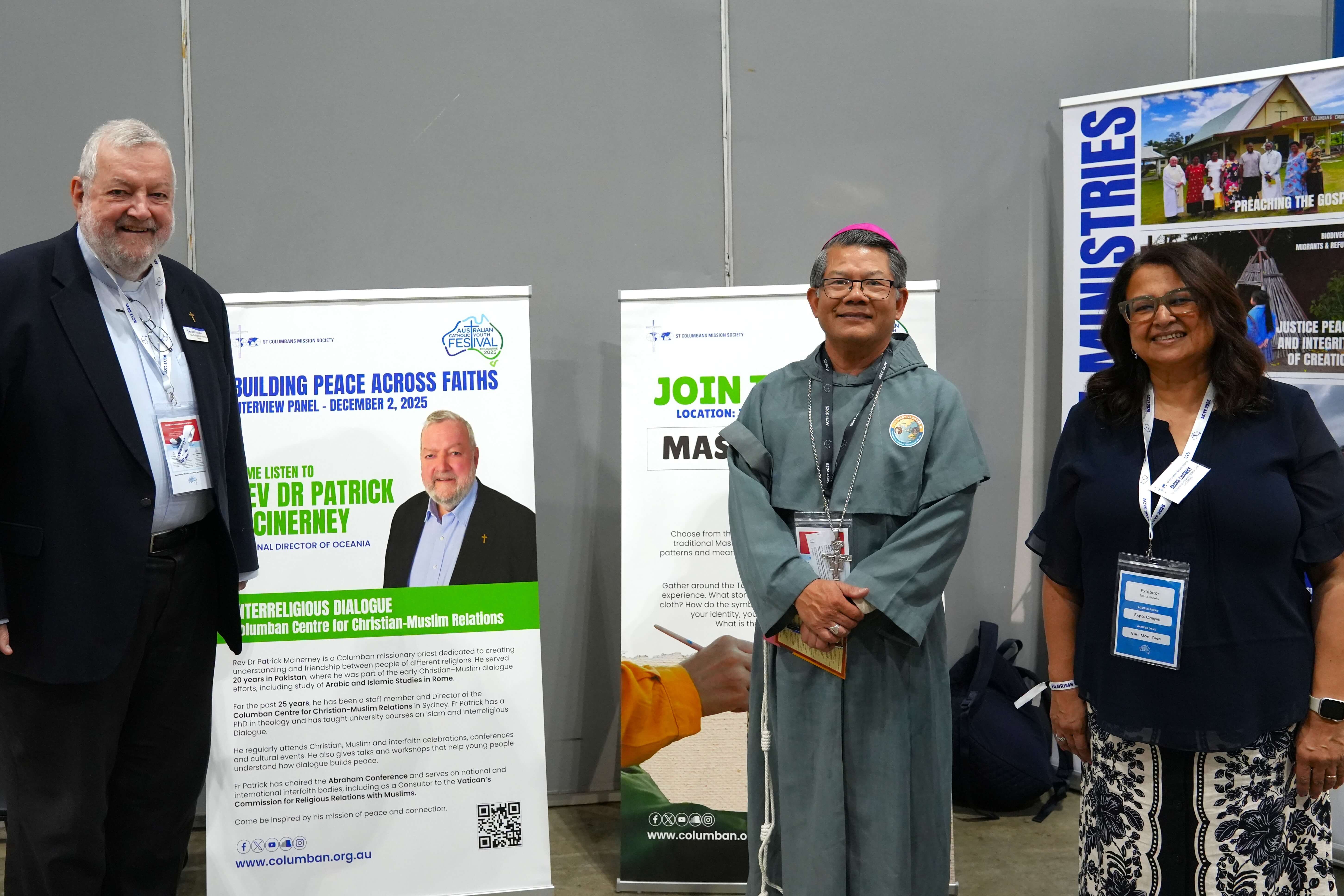 Columban Fr Patrick McInerney and Columban Mission Centre CEO Maha Shawky with Bishop of the Parramatta Diocese, Most Rev. Vincent Long Van Nguyen OFM Conv in front of the Columban booth. Photo: St Columbans Mission Society.