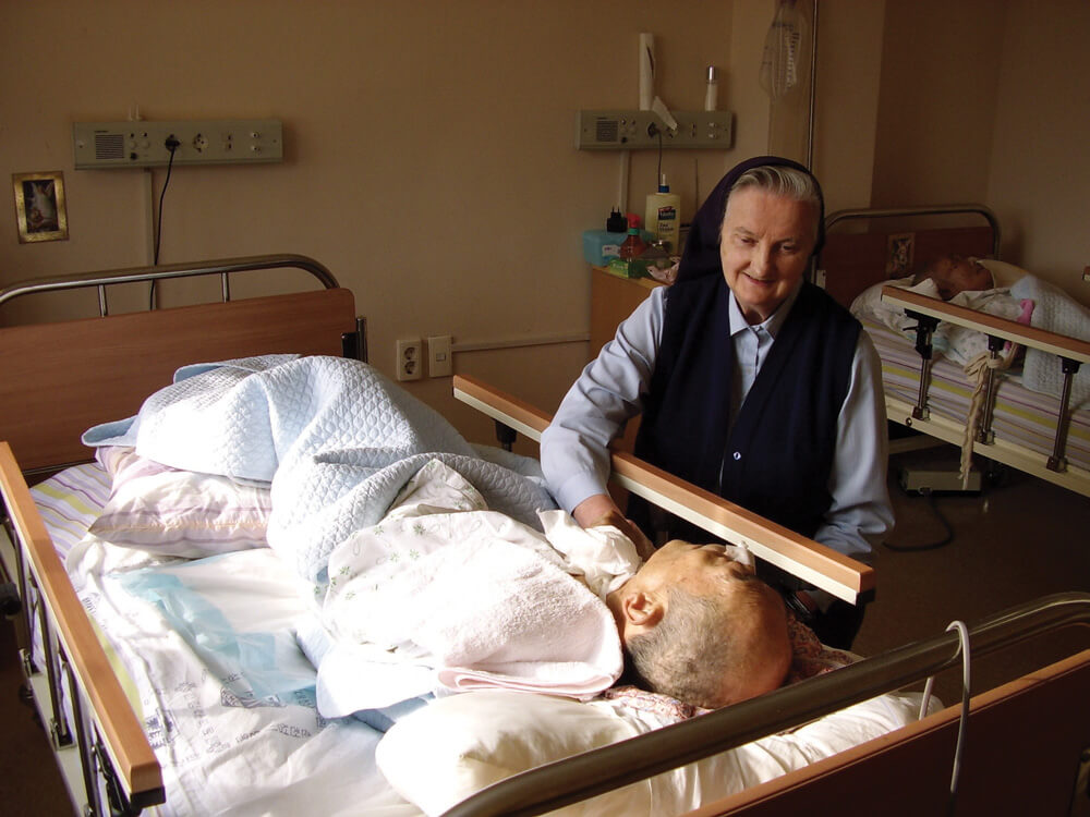 Sr Cecily McMahon with one of the patients at St Columban’s Home for the elderly in Chuncheon. Photo: Missionary Society of St Columban